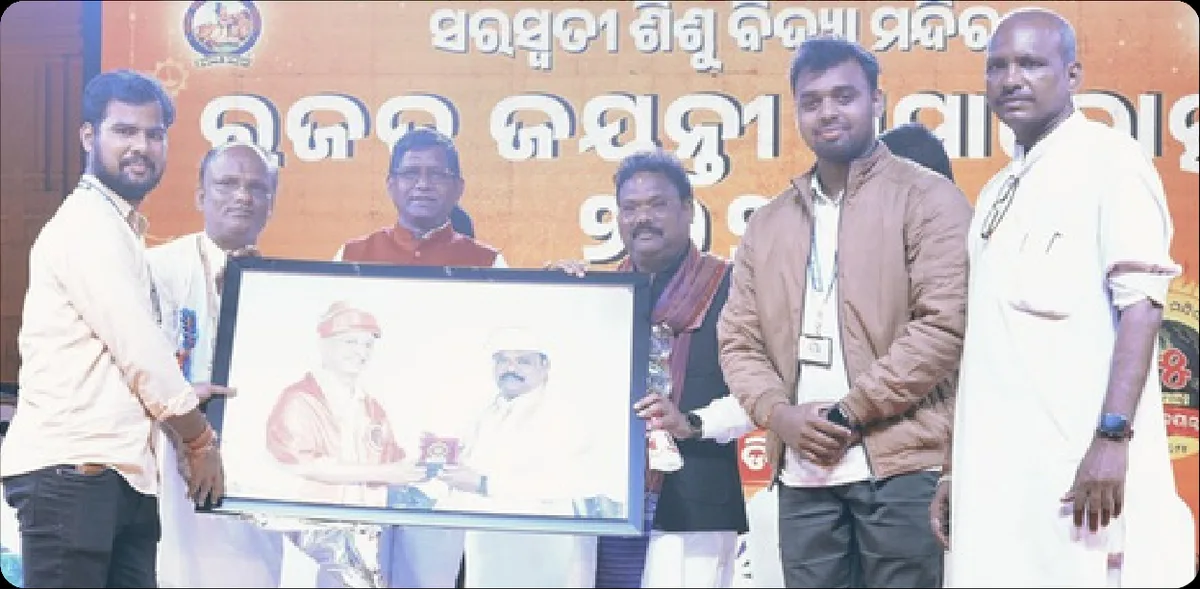 The Beyond Pixel Studio team receiving a framed commemoration from Gokula Nanda Mallik, Minister of State for Fisheries and Animal Resources Development, Odisha