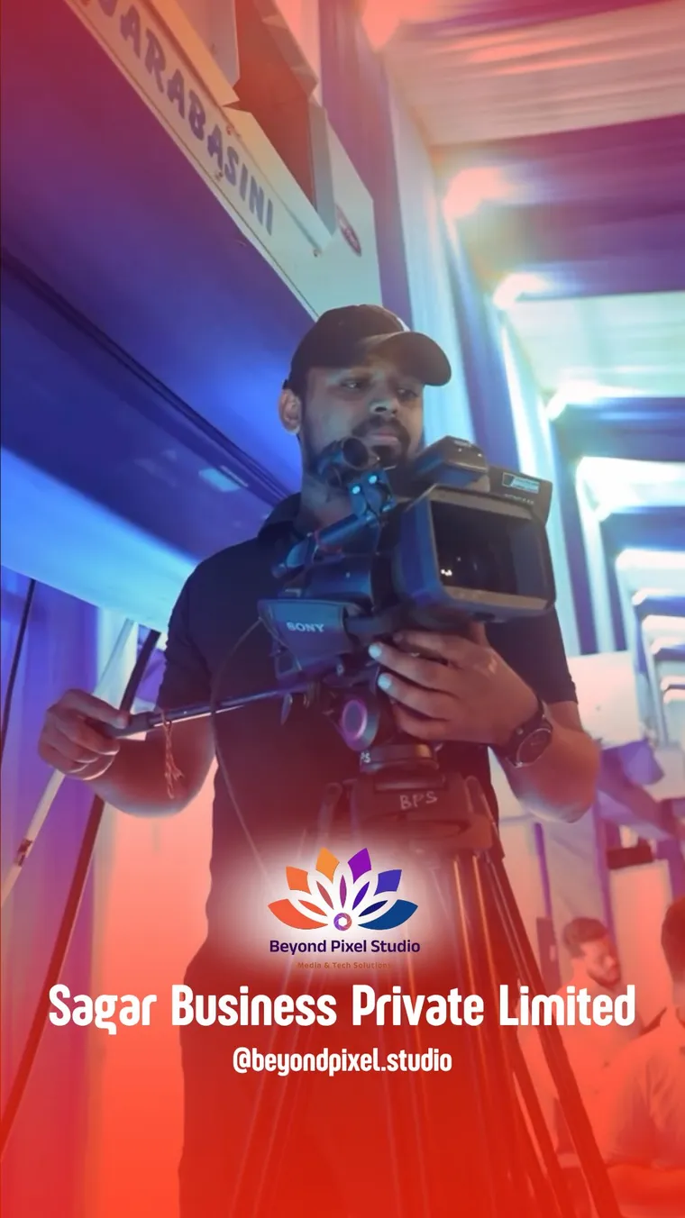 Beyond Pixel Studio camera operator filming at a Sagar Business Private Limited event